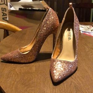 Gold sparkly heel